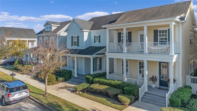 view of front of home featuring a porch and a balcony