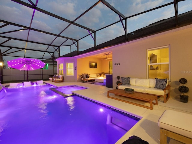 view of swimming pool with glass enclosure, an outdoor hangout area, a fenced in pool, and a patio area