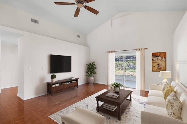 living room with wood-type flooring, high vaulted ceiling, and ceiling fan