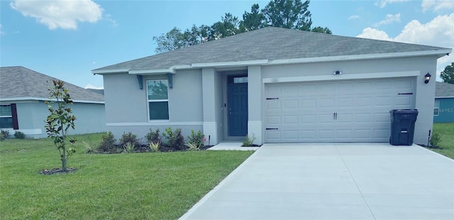 ranch-style home featuring a garage and a front lawn