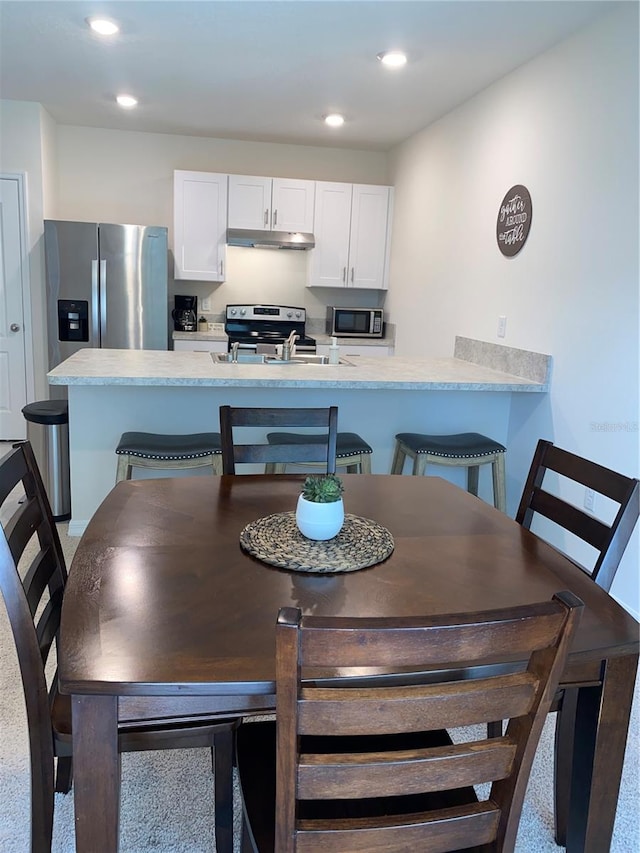 dining room with sink