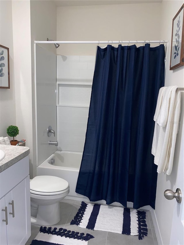 full bathroom with tile patterned flooring, shower / bath combination with curtain, toilet, and vanity