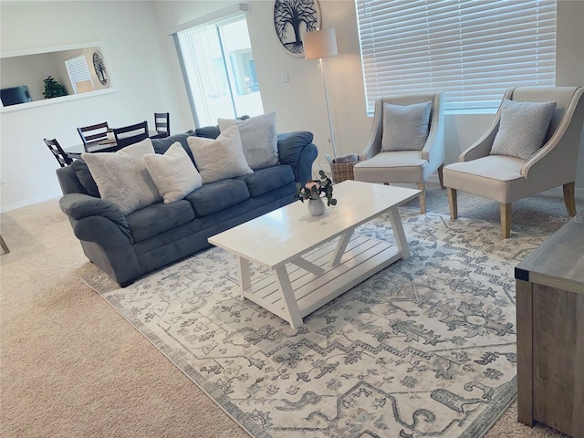 310 Gardenia Ct, Poinciana, FL 34759 - carpeted living area featuring baseboards