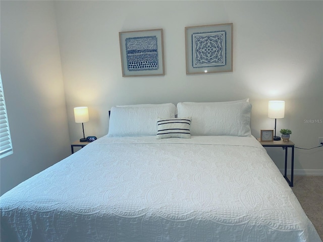 310 Gardenia Ct, Poinciana, FL 34759 - bedroom with carpet flooring and baseboards