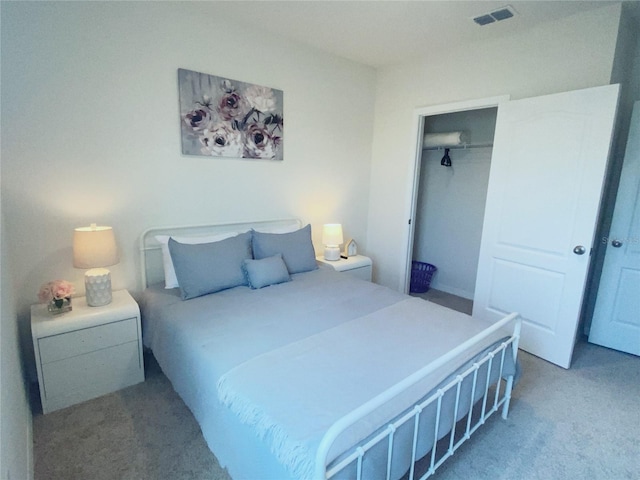 carpeted bedroom featuring a closet