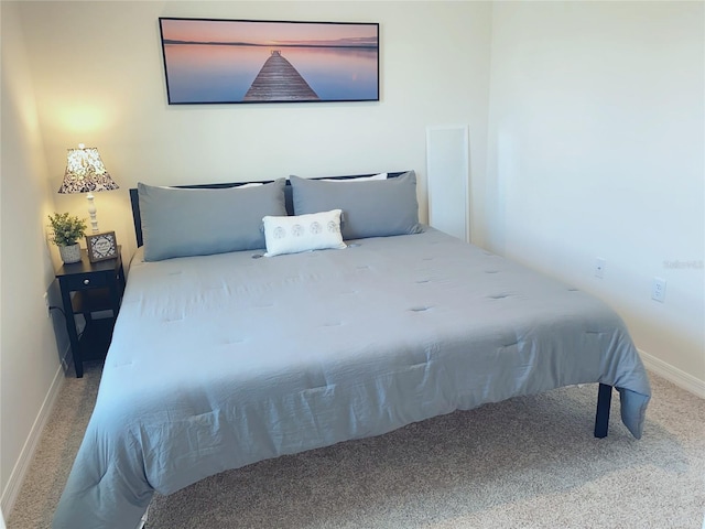 310 Gardenia Ct, Poinciana, FL 34759 - bedroom with carpet and baseboards