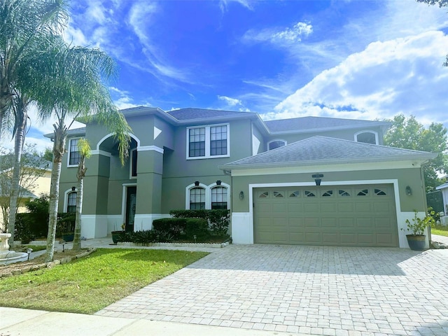 view of front of home with a garage