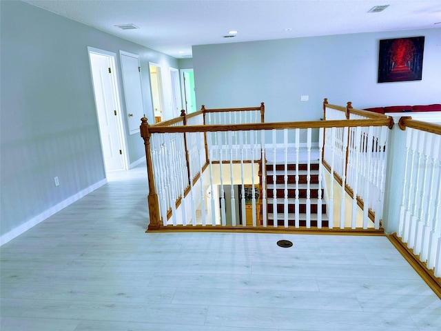 interior space with hardwood / wood-style flooring