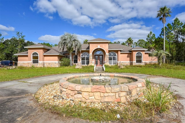 view of mediterranean / spanish-style house