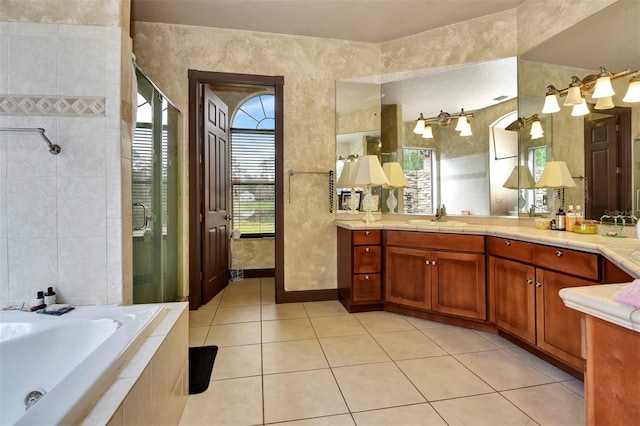 bathroom with vanity, tile patterned floors, and independent shower and bath