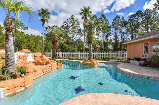 view of swimming pool with a patio