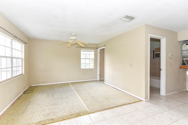 spare room featuring ceiling fan