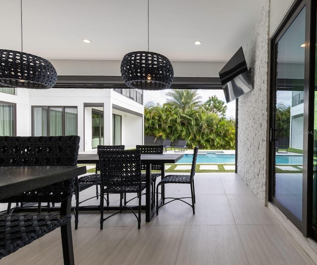 dining area featuring a notable chandelier and plenty of natural light