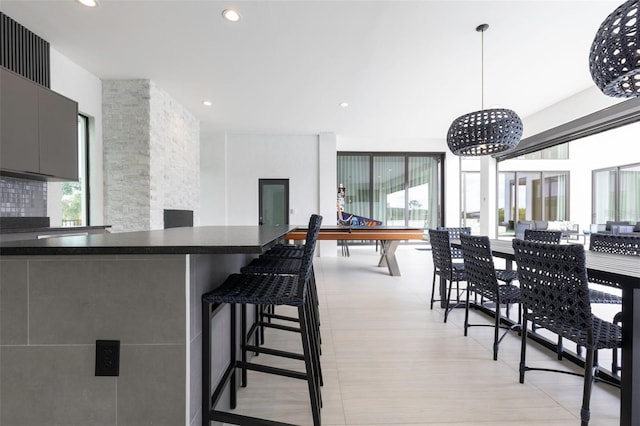 tiled dining space featuring billiards