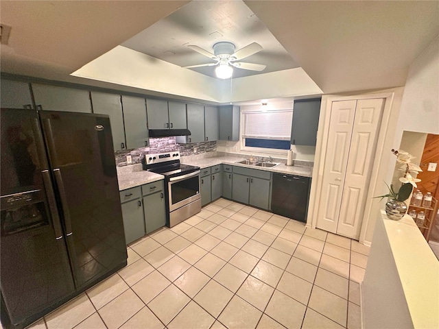 kitchen with decorative backsplash, ceiling fan, sink, black appliances, and light tile patterned floors