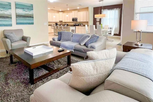 living room featuring light tile patterned floors