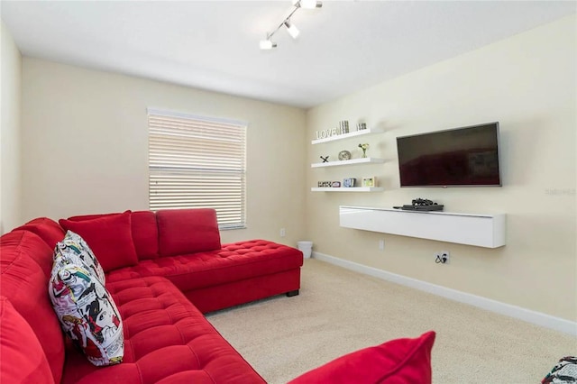 living room featuring carpet and rail lighting