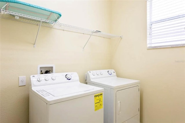 laundry room featuring washer and dryer