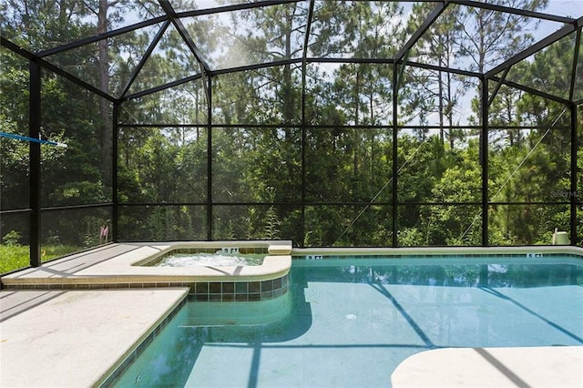 view of pool with a lanai