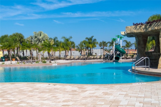 view of pool featuring a water slide