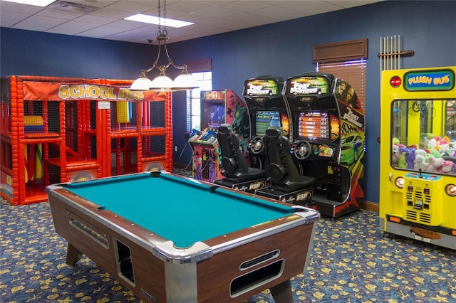 recreation room with a drop ceiling, dark carpet, and billiards