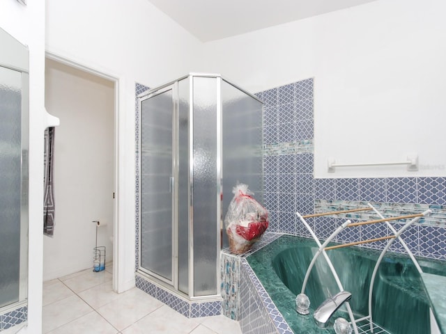 bathroom with plus walk in shower and tile patterned floors