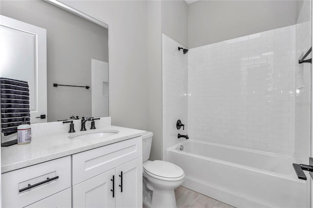 bathroom featuring vanity, wood finished floors, shower / tub combination, and toilet