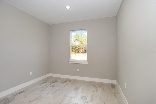 unfurnished room featuring light wood-type flooring