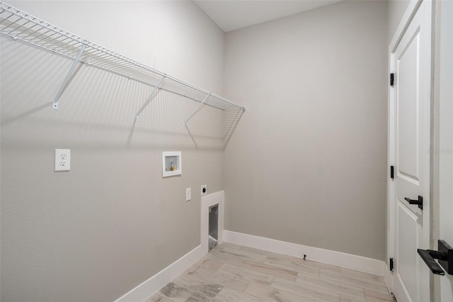 laundry room featuring light hardwood / wood-style floors, washer hookup, and hookup for an electric dryer