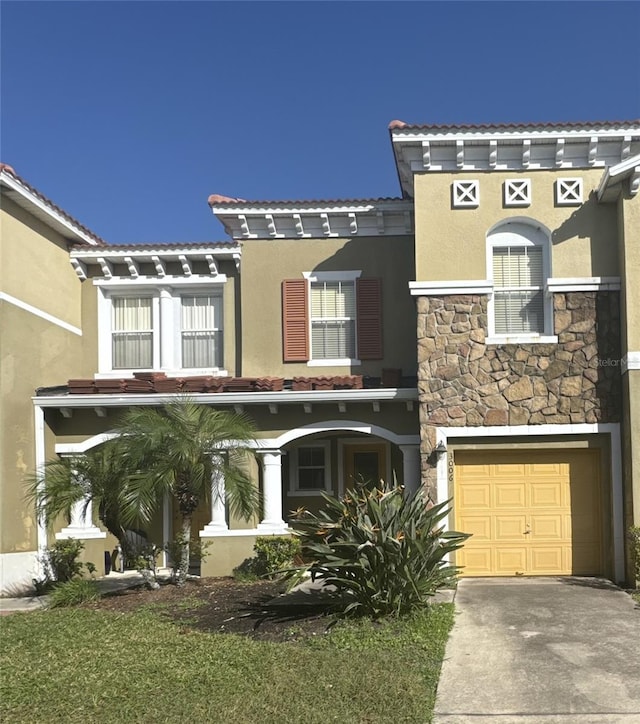 view of front of property featuring a garage