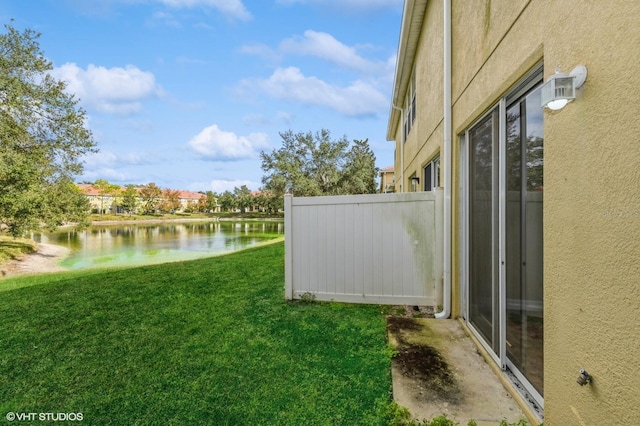 view of yard with a water view