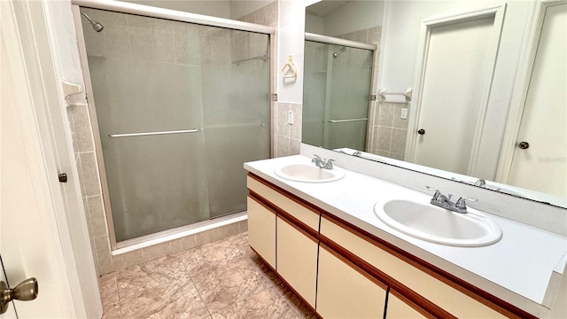 bathroom featuring vanity and walk in shower