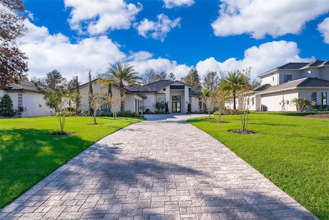 view of front of home featuring a front lawn