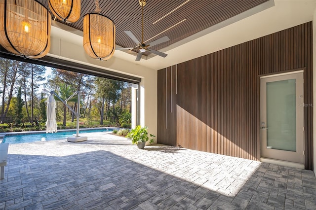 view of patio featuring ceiling fan