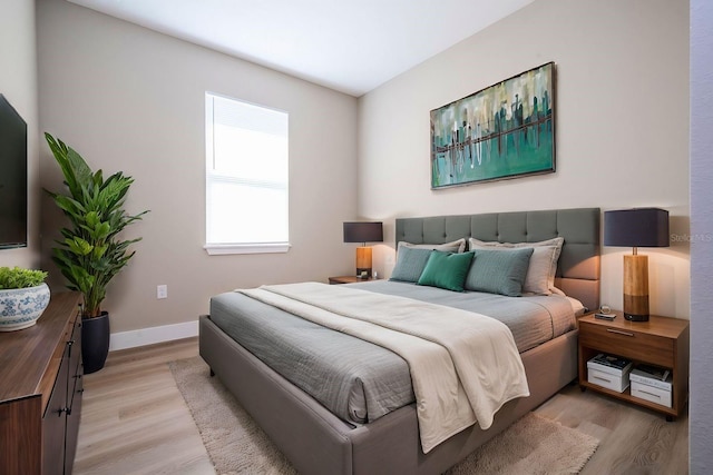 bedroom featuring light hardwood / wood-style flooring