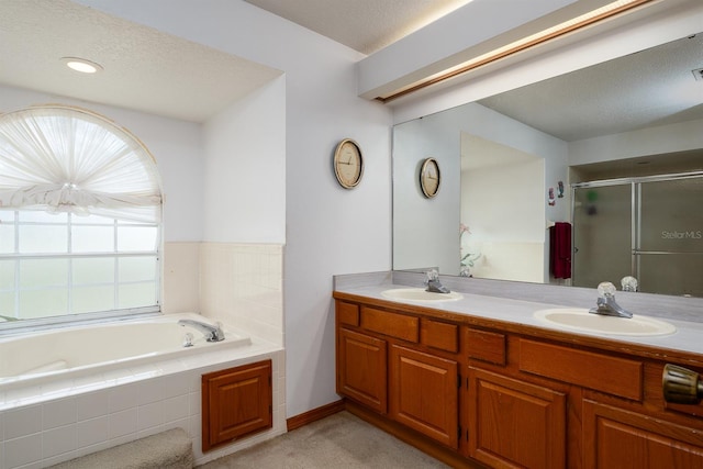 bathroom featuring vanity and plus walk in shower