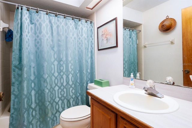 full bathroom featuring vanity, shower / bath combination with curtain, a textured ceiling, and toilet