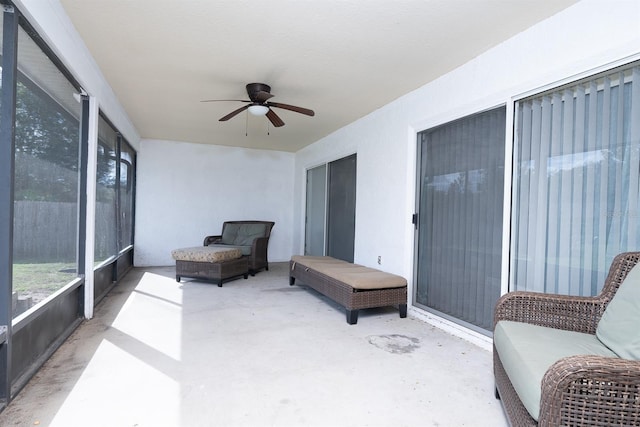 sunroom / solarium with ceiling fan