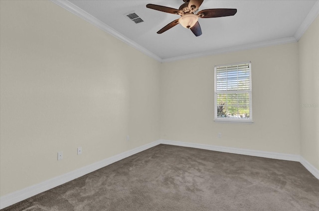 unfurnished room with ceiling fan, carpet, and ornamental molding