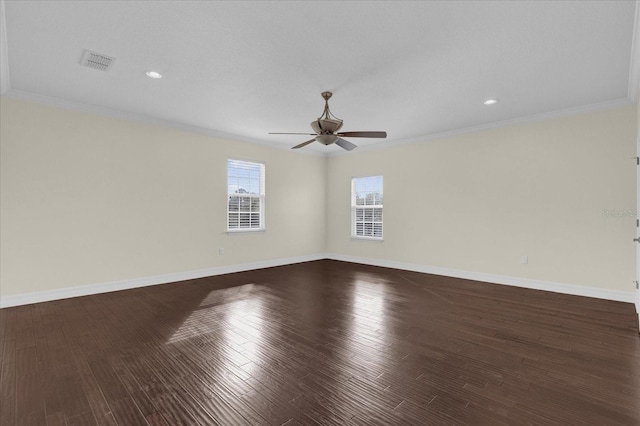 unfurnished room featuring ceiling fan, wood-type flooring, and ornamental molding