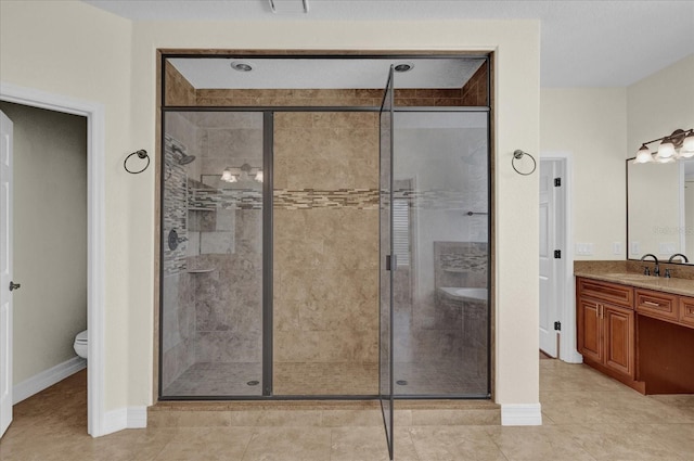 19206 Robertson St, Orlando, FL 32833 - bathroom with a shower stall, vanity, and tile patterned floors
