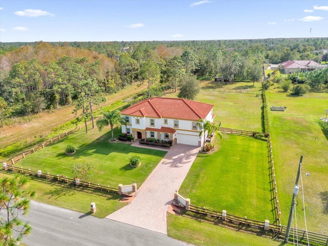 birds eye view of property featuring a rural view