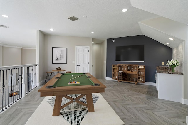 game room featuring lofted ceiling, a textured ceiling, billiards, and light parquet floors