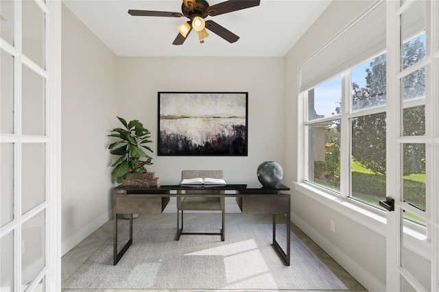 office area with ceiling fan