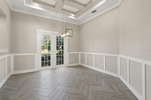 empty room with parquet floors, ornamental molding, coffered ceiling, a chandelier, and a high ceiling