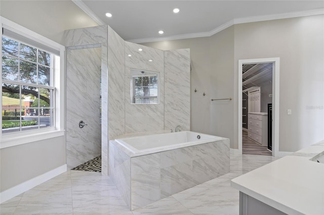 bathroom with vanity, ornamental molding, and shower with separate bathtub