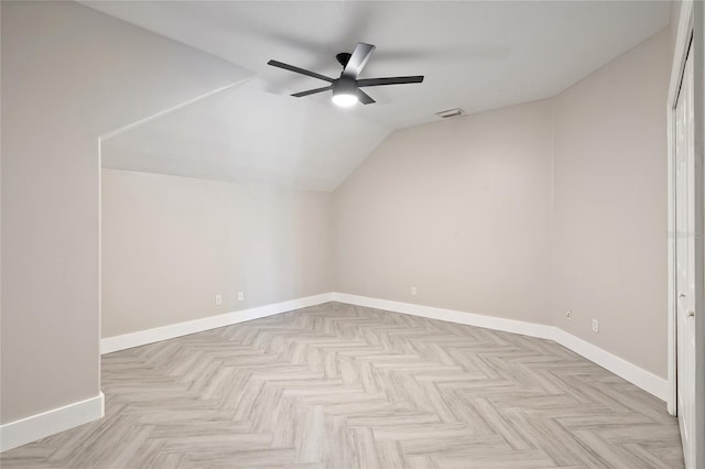 bonus room featuring ceiling fan, lofted ceiling, and light parquet flooring