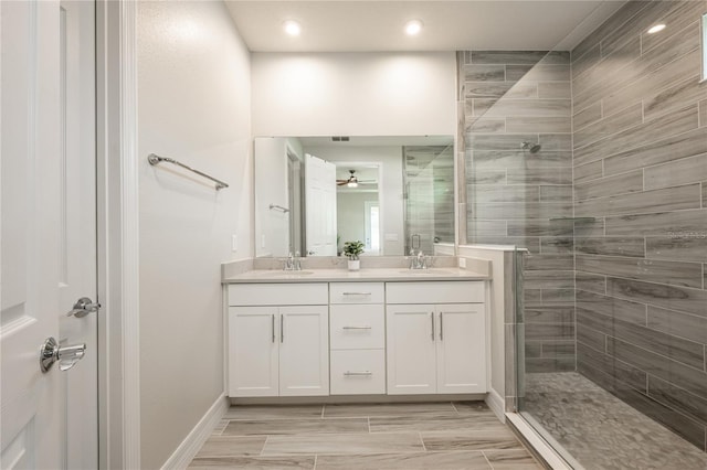 bathroom with vanity and an enclosed shower