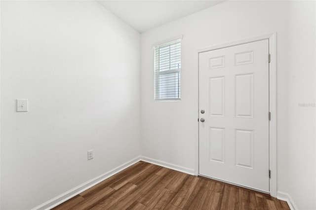 unfurnished room with dark hardwood / wood-style floors