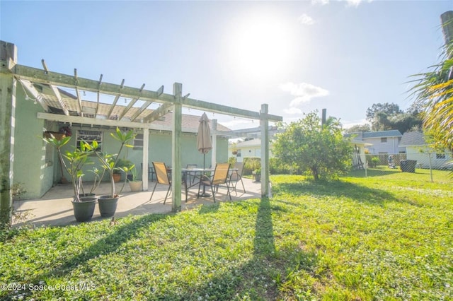 view of yard featuring a patio area and a pergola